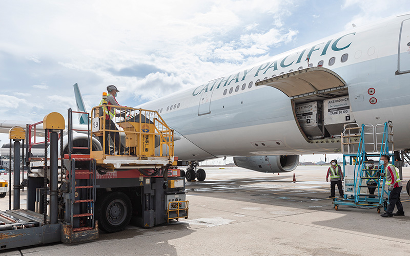 A shipment being loaded onto a Cathay Pacific plane