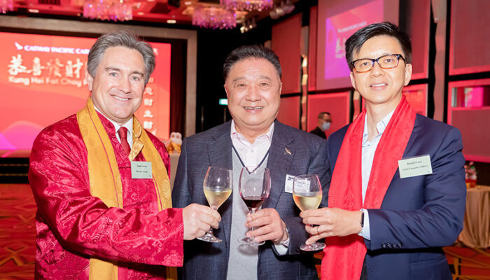 Cathay Cargo’s Tom Owen (left) and Cathay CEO Ronald Lam (right) with Sam Lam, President Trans-AM Air Freight HK Limited (middle)